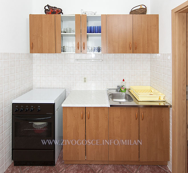 kitchen with electric cooktop, oven